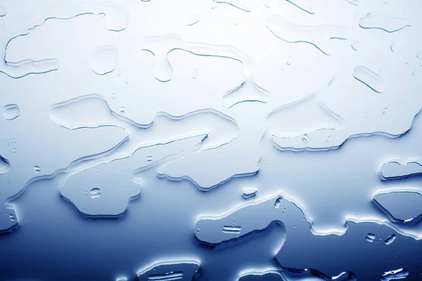 玻璃镜表面喷水 抽象背景 蓝色湿纹理渐变图案 设计水斑顶视图闭合 — 图库照片