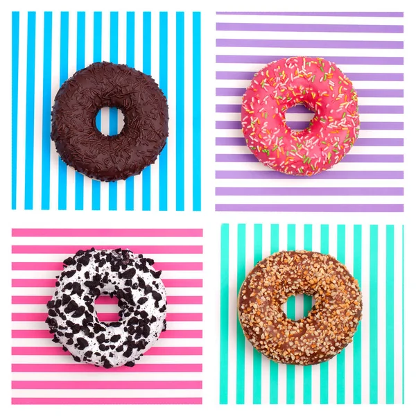 Donuts Diferentes Una Vista Superior Fondo Rayado Multicolor — Foto de Stock