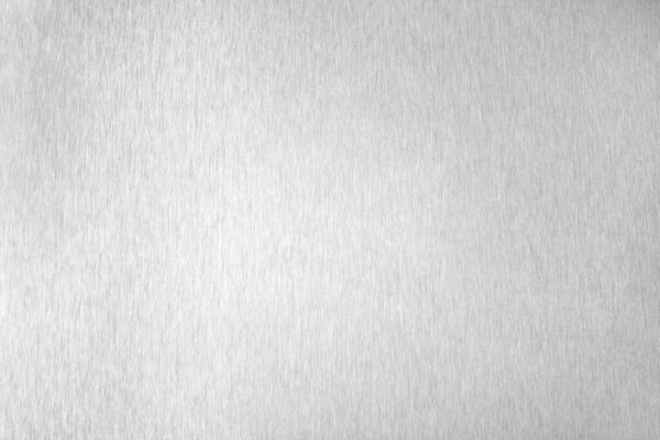 Silver metal shiny empty surface, monochrome shining metallic background, brushed black and white iron sheet backdrop close up, smooth light gray steel texture, art grunge design element, copy space