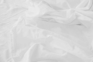 Texture of fabric is white color background,Wavy folds of cloth.	