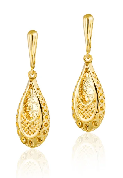 Fashion womens earrings in gold. A precious gift for a woman. — Stock Photo, Image