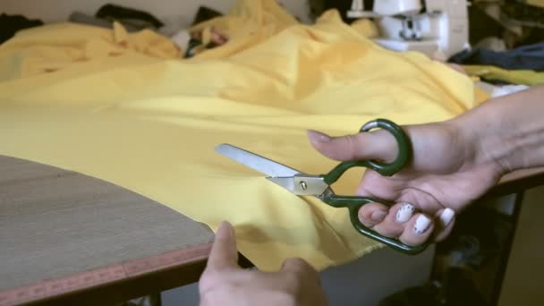 Seamstress mode yellow fabric scissors. — Stock Video