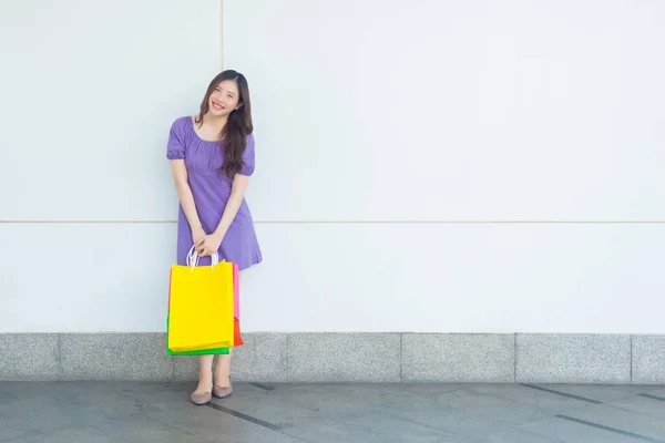 Asian woman in shopping. Happy woman with shopping bags enjoying in shopping. shopping, lifestyle concept. copy space