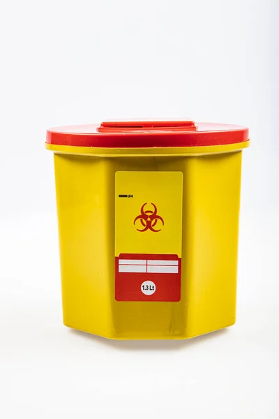 Medical Waste Rubbish Bins 1,3 liter. Yellow biohazard medical contaminated clinical waste container isolated on white background.