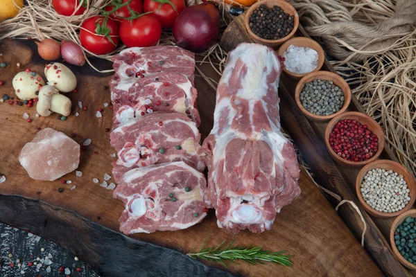 Raw fresh meat lamb, lamb neck (Lamb Gerdan) on wooden table. Copy space for Text. sirloin on bone neck.