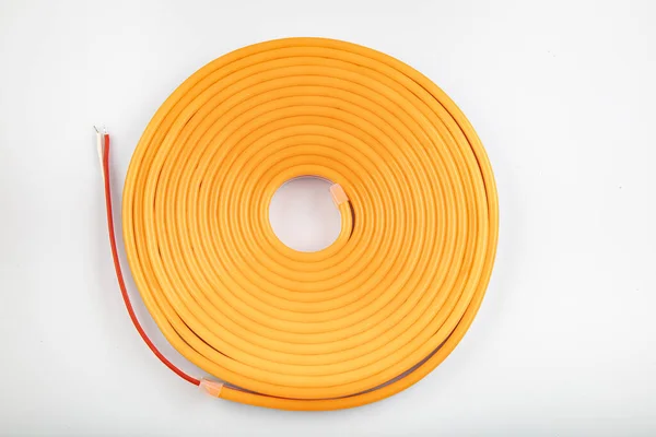 Orange flexible led tape neon flex. Orange Neon Flexible strip light 5 meters Watch on white background.