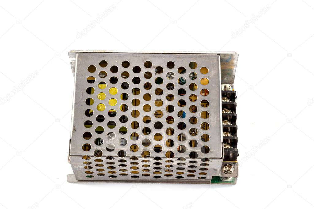 LED Driver 25 w in metal case. Switching power supply DC to DC isolated on white background.