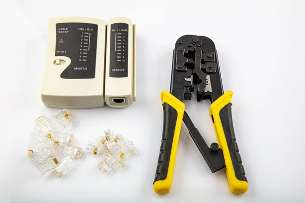 Network Tool Kit Professional, Cat6 Cat5e EZ Rj45 Crimp Tool, 8P8C RJ45 Connectors, Cable Tester, Stripping Pliers Tool Set. Data crimp tool kit isolated on white background.