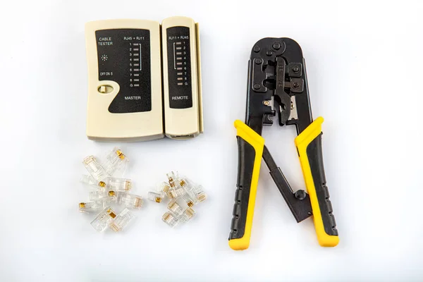 Network Tool Kit Professional, Cat6 Cat5e EZ Rj45 Crimp Tool, 8P8C RJ45 Connectors, Cable Tester, Stripping Pliers Tool Set. Data crimp tool kit isolated on white background.