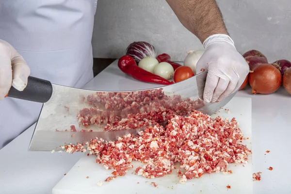 meat kebab restaurant chefs, making minced meat in Turkey. Meat mincing is called local minced meat ( satir kiyma ) or armor minced (zirh kiyma).