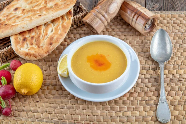 Lentil soup (Turkish: Mercimek corbasi ) on the wooden table. — Stock Image Lentil Soup Turkish Mercimek Corbasi Wooden Table Royalty Free Stock Images