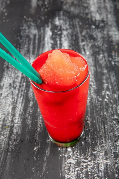 Watermelon Frozen Drink. Glass of cold  watermelon frozen or smoothie drink with foam.