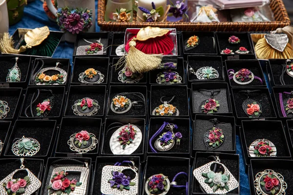 Jewelry diamond rings and necklaces show in luxury retail store window display showcase