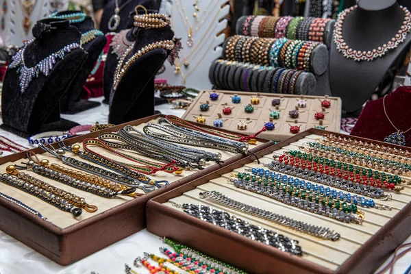 Jewelry diamond rings and necklaces show in luxury retail store window display showcase