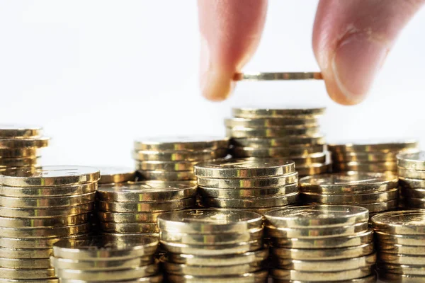 Bozuk paralar farklı pozisyonlarda üst üste yığılmış. Türk lirası. Emlak ve ipotek.