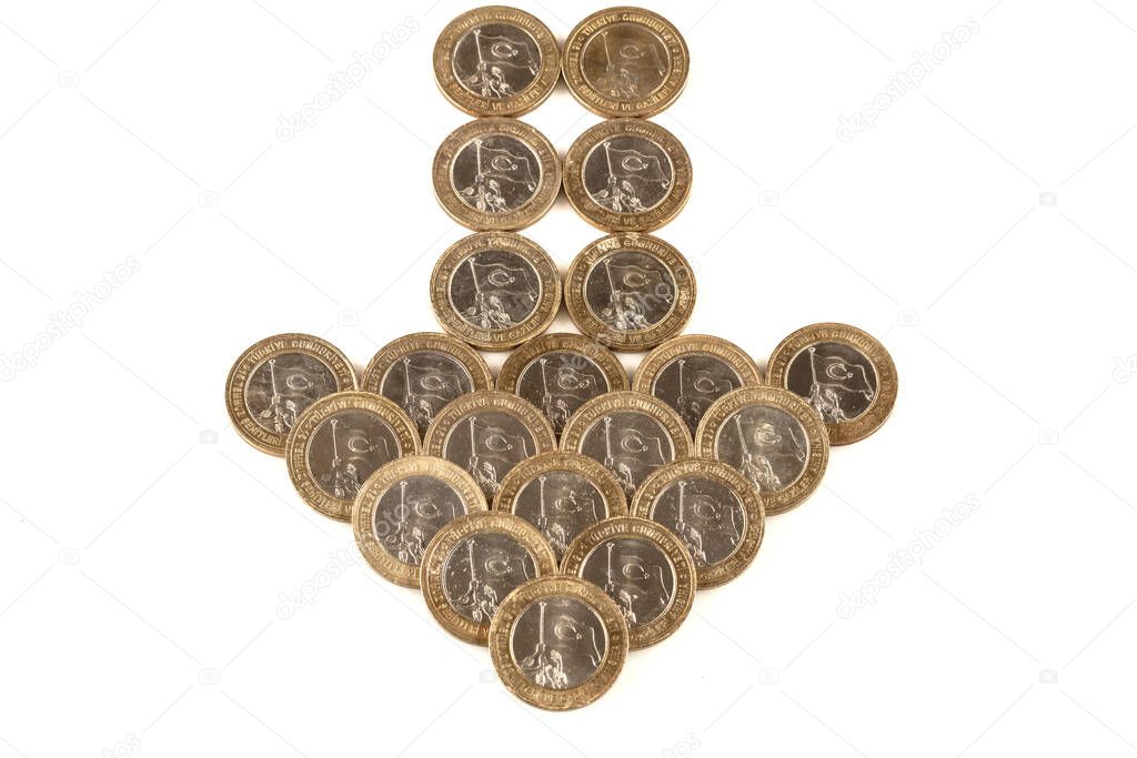 One Turkish Lira closeup isolated on white background. Stacks of Turkish coins, one lira special version.