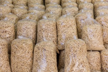 raw pasta in the bags, close-up view
