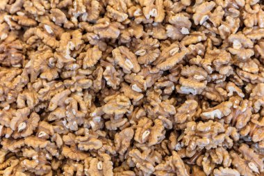 close up of a pile of dry wallnuts in the market