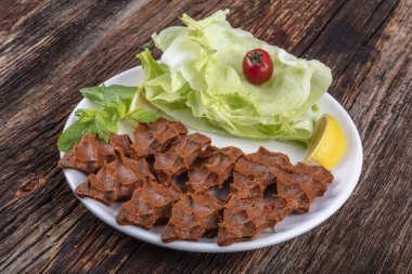 Cig kofte, Türk ve Ermeni mutfağında çiğ et yemeği. Türk sigarası 