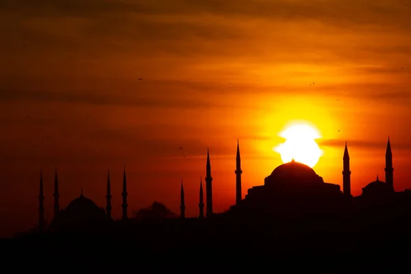 Silhouette of Istanbul view of the sunset in the rays of the sun. Istanbul is the largest city in Turkey.