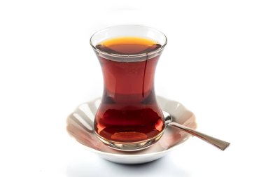 glass of tea with a cup of hot drink