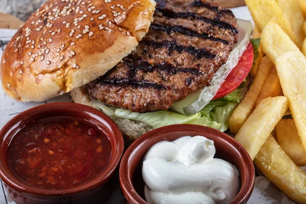 delicious burger with meat and vegetables