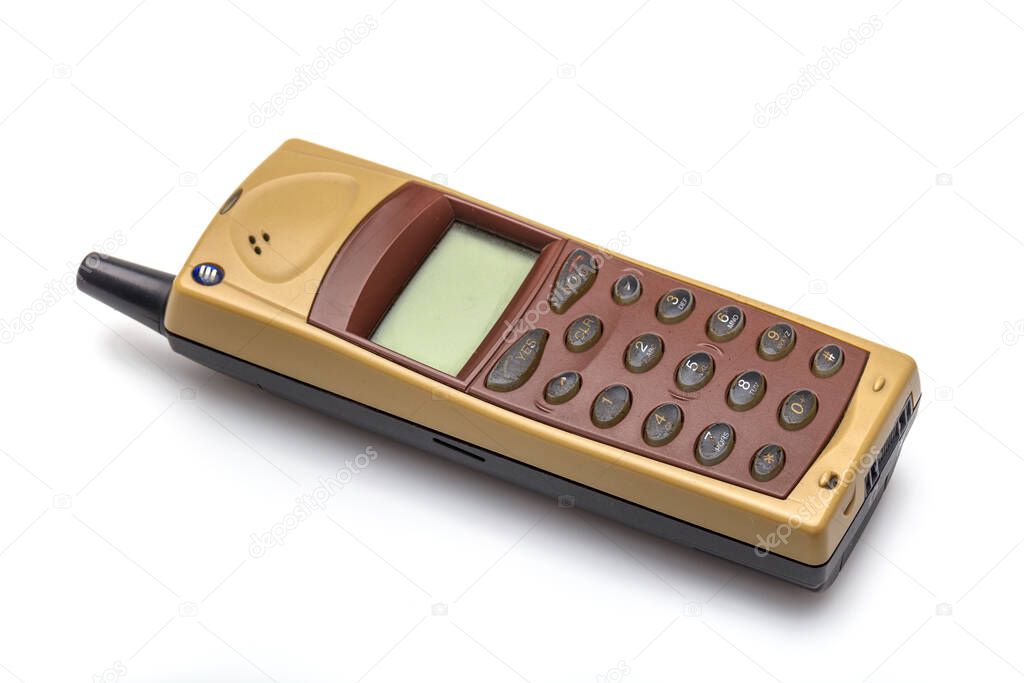 old mobile telephone on white background