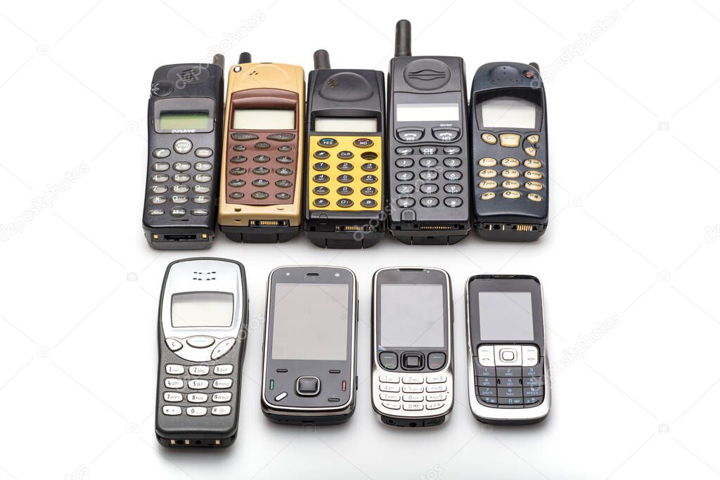old mobile telephones on white background