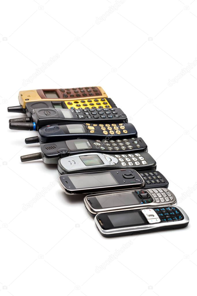 old mobile telephones on white background
