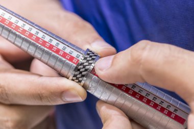 close up of production of silver rings