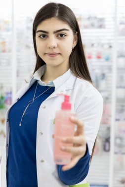a female pharmacist working at the pharmacy