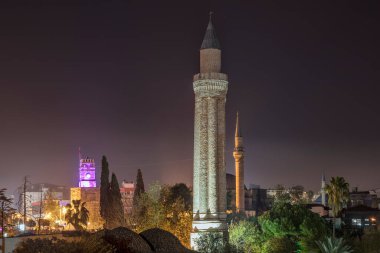 Historical Landmarks Grooved Minaret (Yivli Minare) Kaleici and Historical clock tower - Antalya, Turkey