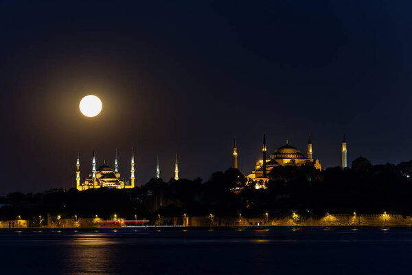 Istanbul, Turkey-October 27, 2019: view of The Blue Mosque at night with a full moon