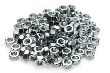 close-up view of metal nuts isolated on white background