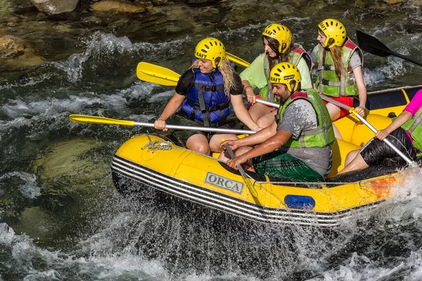 Rize, Turkey - July 24,2015 :Tourists who rafting on the river storm(Firtina Deresi) Rize, Turkey. Photo taken from Rize City, Turkey.