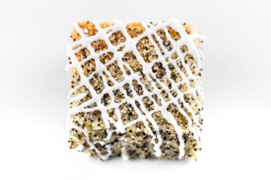 close up of a piece of poppy seed cake
