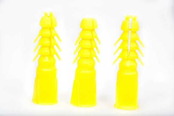 Yellow Orange Plastic Bottles White Background — стоковое фото