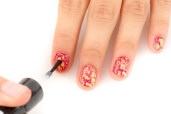 Hand with nail red manicure isolated on white background