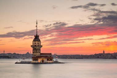 Istanbul, Turkey-July 27, 2019: illuminated Maiden's Tower at the sunset