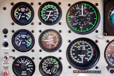 airplane dashboard with a speedometer