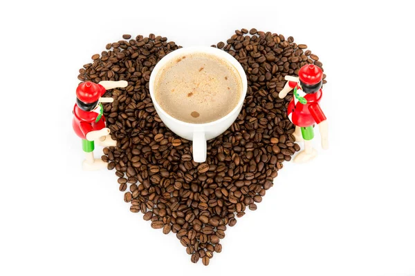 Heart coffee frame made of coffee beans on the white background