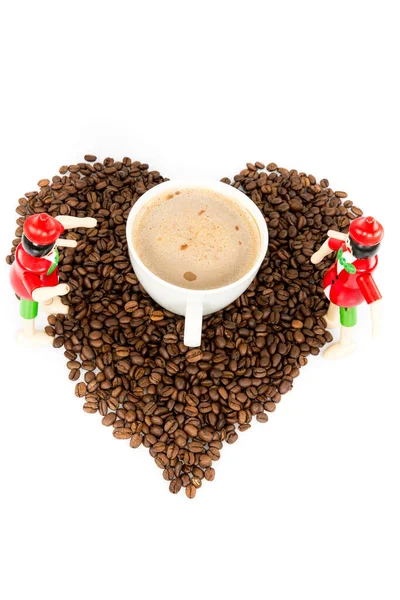 Heart coffee frame made of coffee beans on the white background