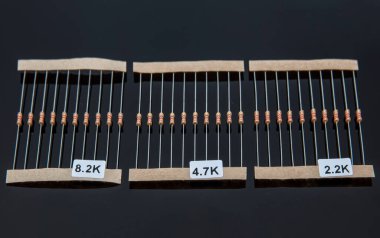 Resistor passive two-terminal electrical component for electrical resistance to reduce current flow and lower voltage level within the circuit.
