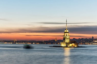 Istanbul, Turkey-July 27, 2019: illuminated Maiden's Tower at the sunset