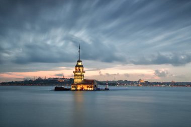 maiden's tower at sunrise, view from the bosphorus strait of istanbul, turkey