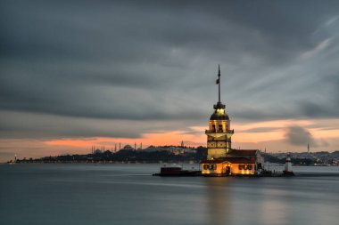 the maiden's tower of the neva river at sunset, in the evening, istanbul, turkey view