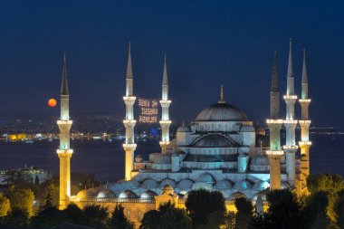 ISTANBUL, TURKEY - MAY 16, 2019:  Islamic message lettering hanging on Mosque  