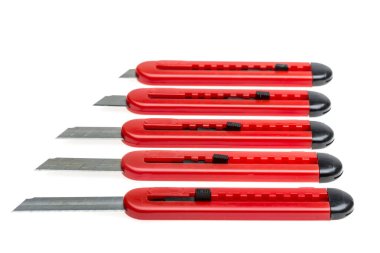 stationery knives white isolated on a background