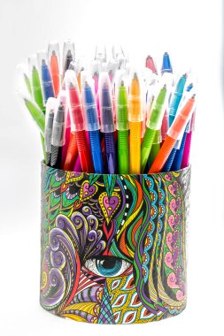 set of different colored pens on white background