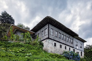 RIZE, TURKEY - July 26, 2015: The historical Ottoman villa in the tea garden, Findikli, Rize.
